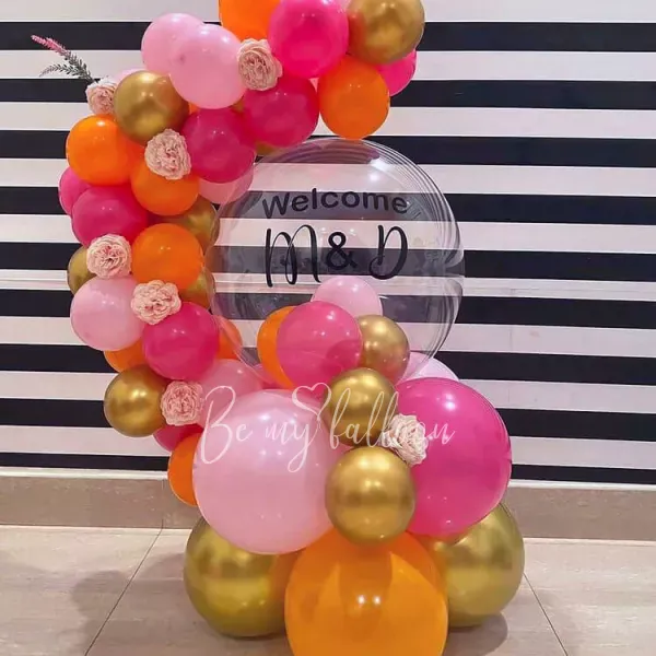 Welcome! organic balloon garland composition